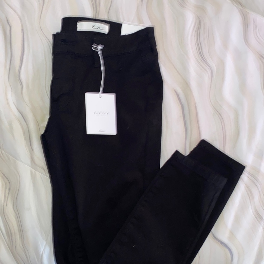 Brand new mid rise kncan black skinny jeans